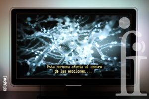 Televisor en el que se ve la imagen de una neurona y el subtitulado para personas con discapacidad auditiva